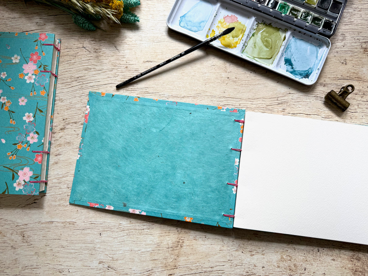carnet d'aquarelle A5 paysage ouvert à la première page